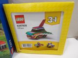 yellow picture frame with a picture of a toy truck and a box of legos