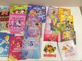 a lot of children ' s books on the table