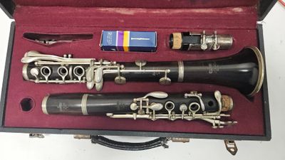 three clarinets in a case on a table