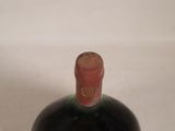 a bottle of wine that is sitting on a table