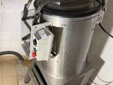 a machine that is sitting in the corner of a room