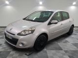 a picture of a small white car parked in a garage