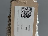 a bottle of wine with a tag on it