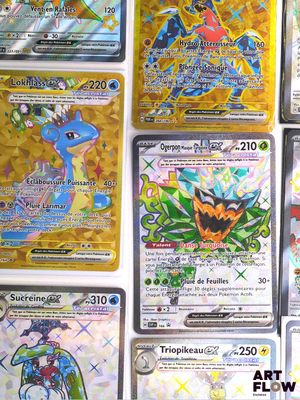 many different types of pokemon cards on the table