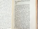 an open book with a picture of a bird on it