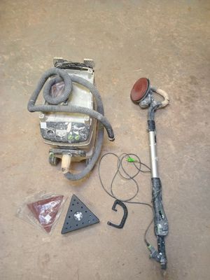 an image of a vacuum and other items on the floor