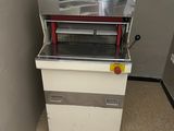 a machine that is sitting in the corner of a room