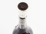 a bottle of wine that is sitting on a table