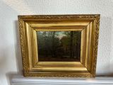 a picture of a painting hanging on a wall next to a radiator