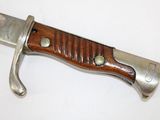 a knife that is laying on a table