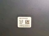 a close up of a sticker with a qr code on it