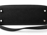 a black purse with a long strap and a metal clasp