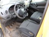 a yellow car with black seats and a steering wheel