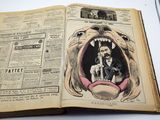 un livre ouvert dans lequel figure l'image d'un chien