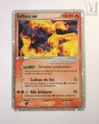 a close up of a pokemon card on a table