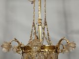 a chandelier hanging from the ceiling in a room