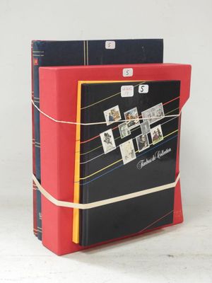 a red and black book with pictures on it