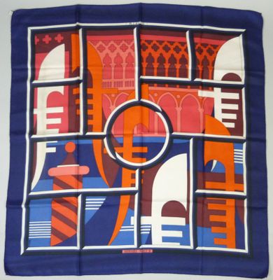 blue, orange, and white square scarf with a picture of a building