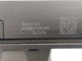 an image of a close up of a metal object with a qr code on it
