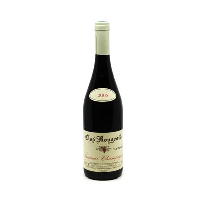 a bottle of wine that is sitting on a table