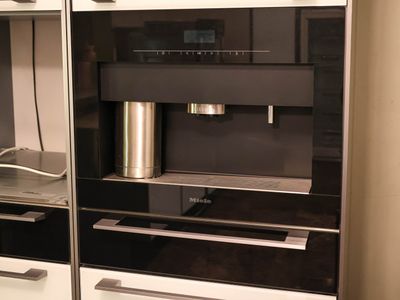 an image of a modern kitchen with stainless steel appliances