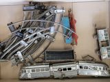 a box with a bunch of toy trains in it
