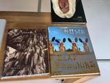 three books sitting on a table next to each other