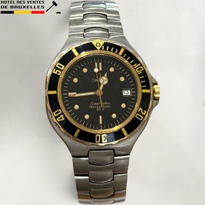 a watch that is sitting on a white surface