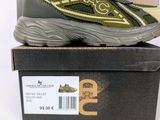 the box is full of a pair of shoes on top of a box