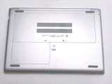 a silver laptop that is sitting on a table