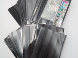 a lot of black folders sitting on a table