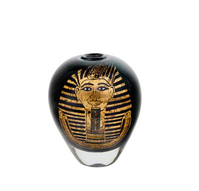 a black and gold vase with an egyptian design on it