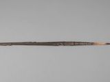 an image of a knife with a wooden handle on it