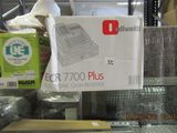 a box with a calculator sitting on top of it