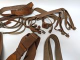 a lot of belts and other items that are on the table