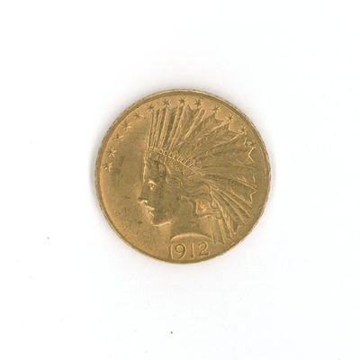 une image d'une pièce d'or sur une surface blanche