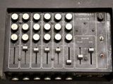 a close up of a mixer with buttons and knobs