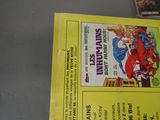 a close up of a comic book on a table