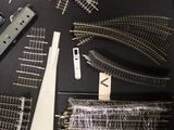 many different types of train tracks on the table