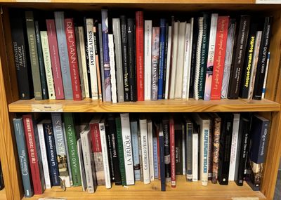 a book shelf with many books on it