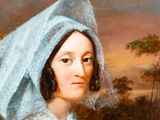 portrait of a woman in a blue dress and a white veil