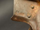 a close up of a piece of metal with rust on it
