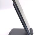 a close up of a cell phone on a stand