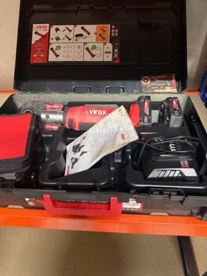 a tool box with tools in it sitting on a table