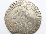 an old silver coin with an image of a woman on it