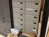 a lot of boxes and boxes on the floor in a room