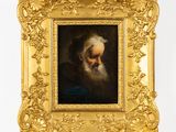 un tableau représentant un vieil homme barbu, dans un cadre doré
