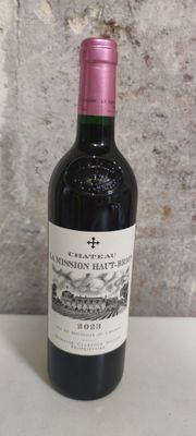a bottle of wine that is sitting on a table