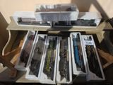 a lot of toy trains sitting on a table