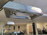 an image of a commercial kitchen with stainless steel appliances
